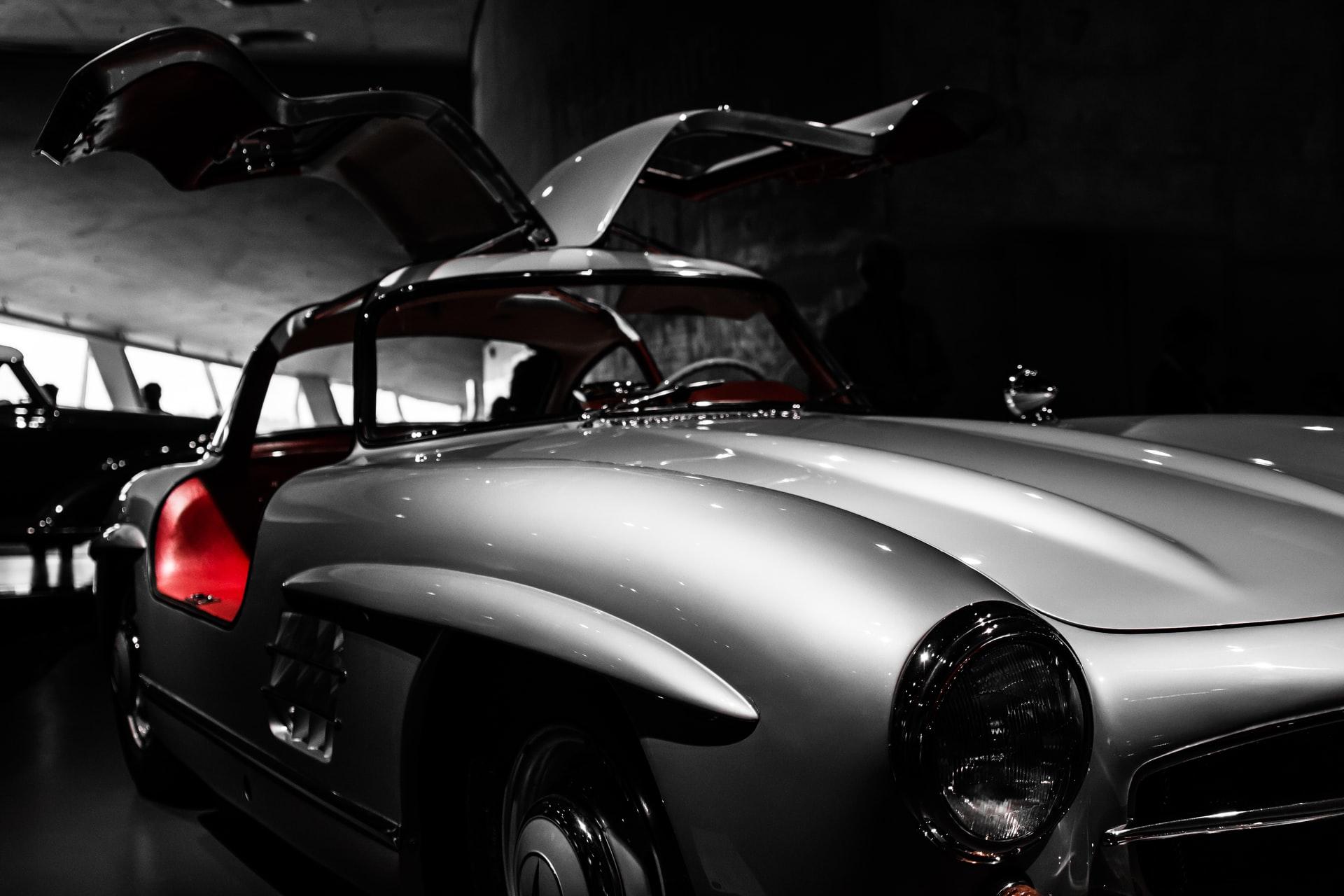 Gullwing doors are named for their wing-like look when open, since they open from the bottom.