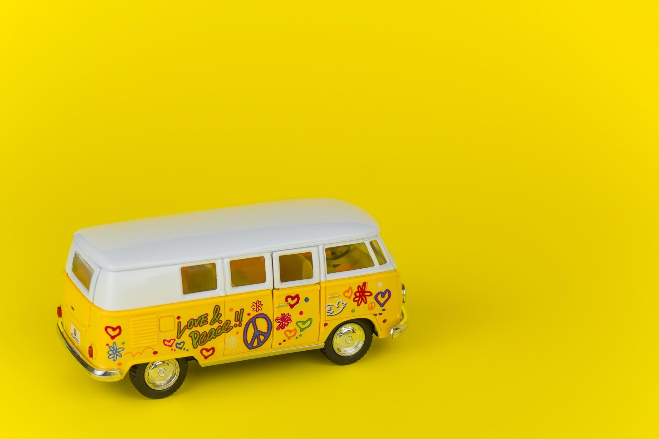 A hippie bus on a yellow background 