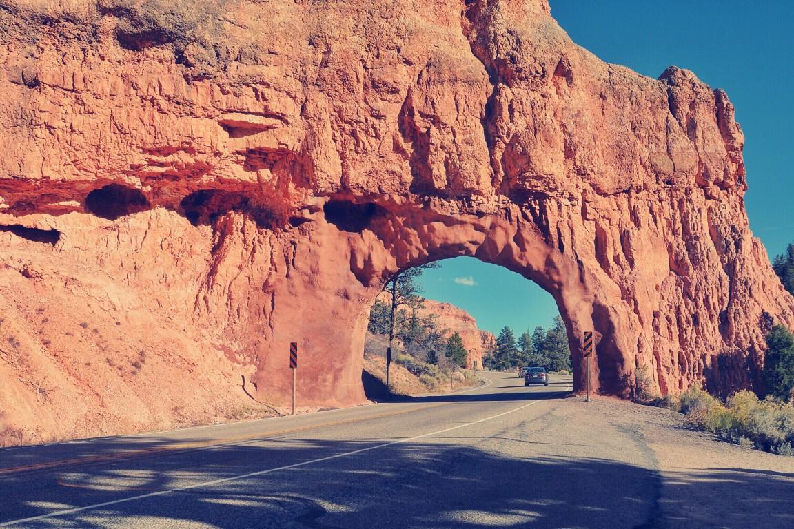 Famous arch in the road in Dixie National Forest, Utah