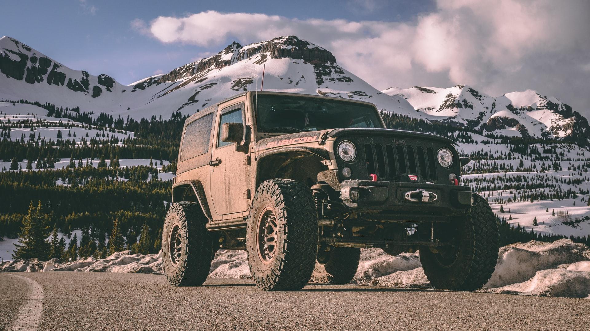 The Jeep Wrangler Unlimited is an affordable car perfect for nature-loving campers.
